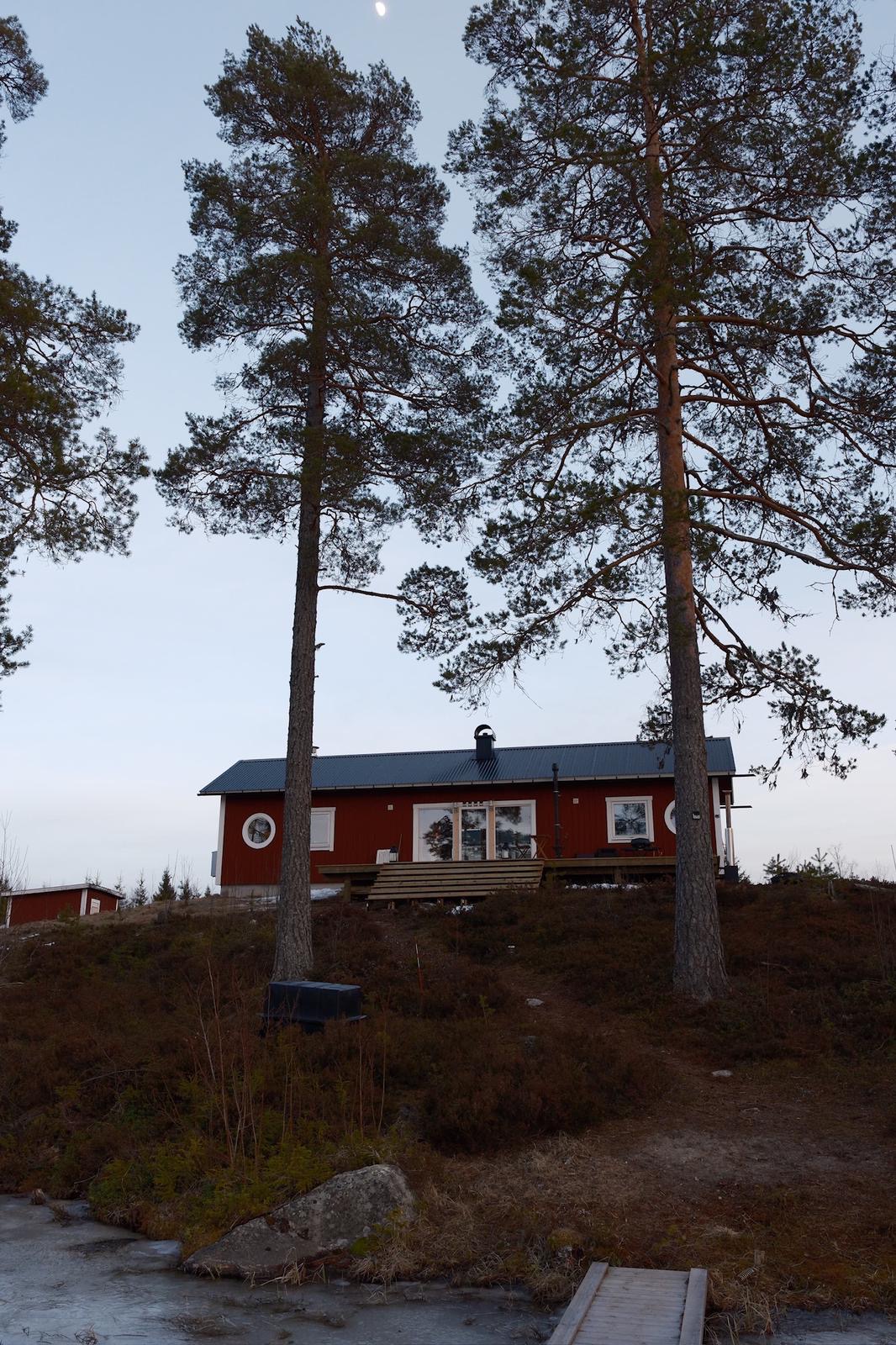 A traditional Swedish stuga painted in deep Falu Red